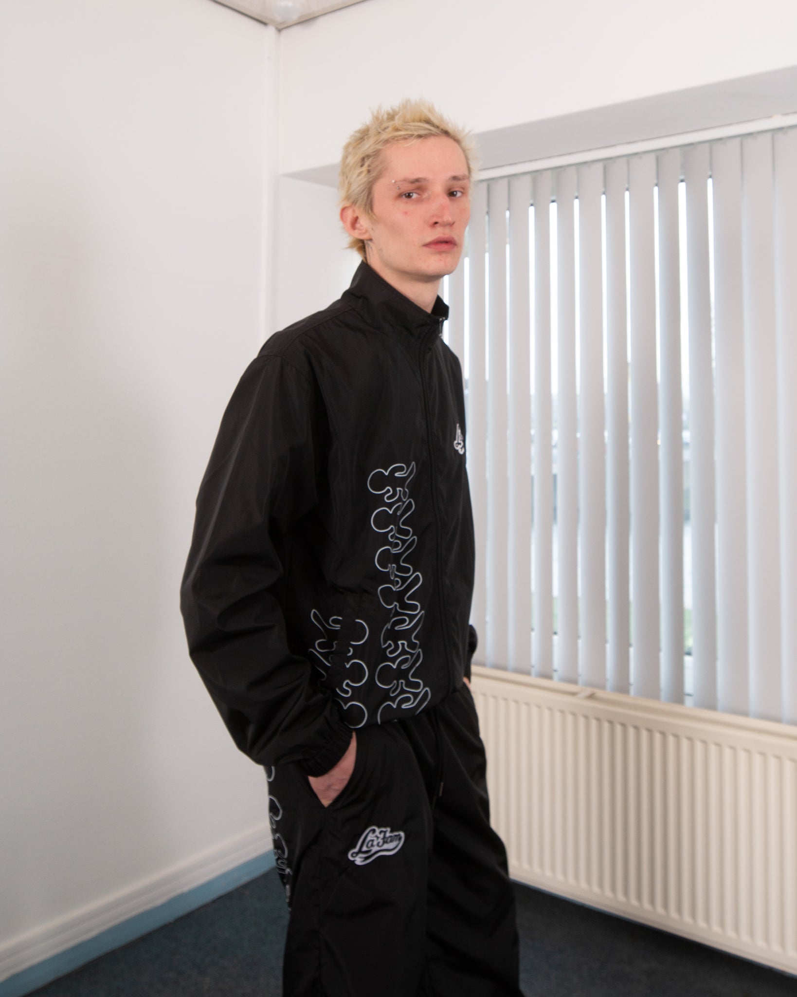 running rico trackie jacket black